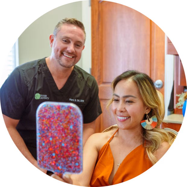 Nooga Dentistry doctor and patient smiling